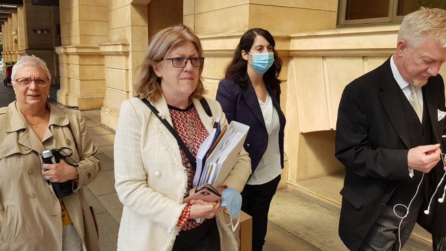 Ms O'Connor and her supporters leave the Legal Practitioners Disciplinary Tribunal. Picture: Sean Fewster.