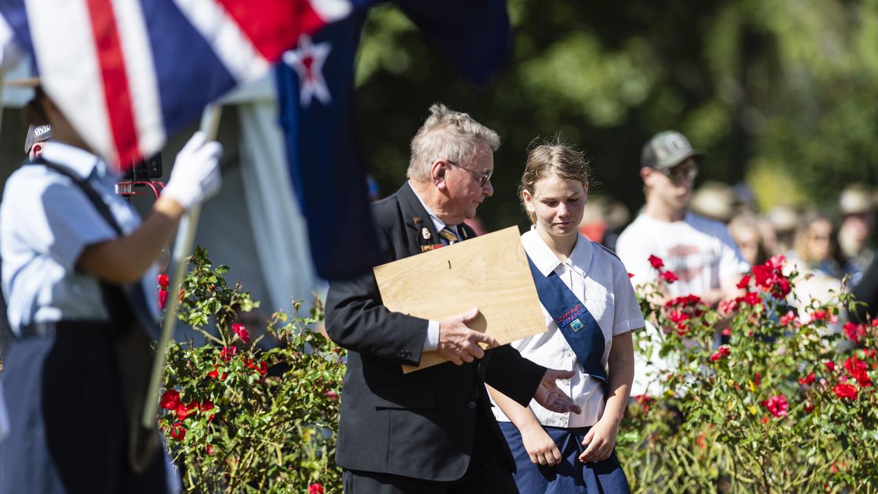 Daisy Zagorsky is presented the Spirit of Anzac Award by Lindsay Morrison at the Anzac Day Toowoomba mid-morning Service of Remembrance at the Mothers' Memorial, Tuesday, April 25, 2023. Picture: Kevin Farmer