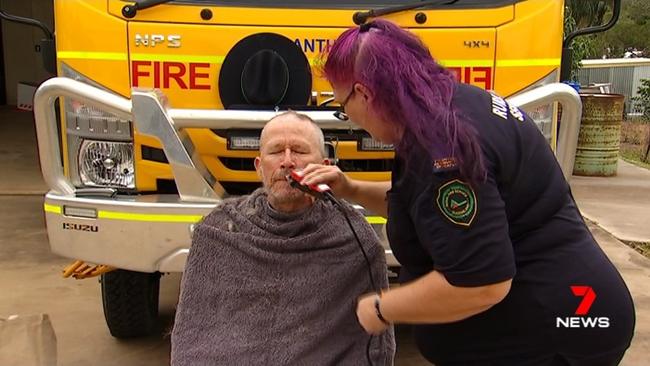 Grantham RFB volunteer Geoff Purton shaved off his hair and beard to raise money for victims of the 2019/20 bushfires. Photo: 7 News.