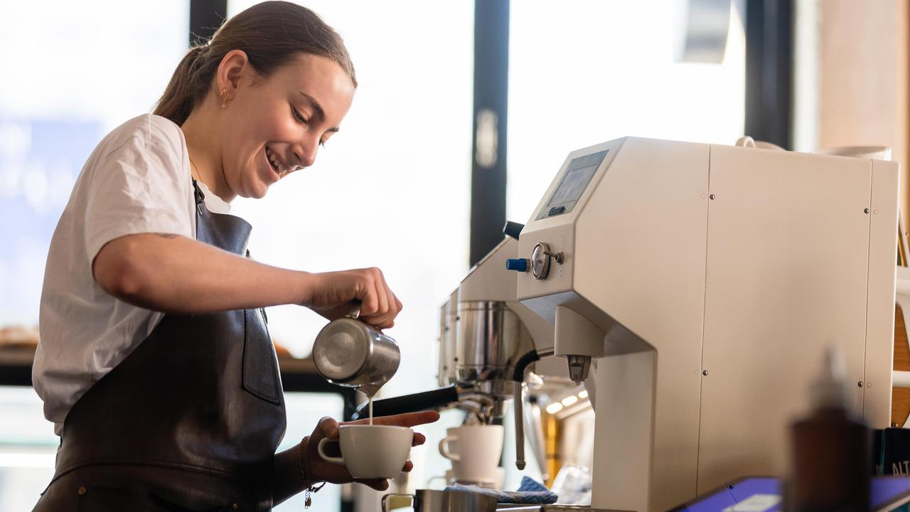 Hundreds of Melbourne cafes are replacing baristas with futuristic automated milk steamers. Picture: Jason Edwards