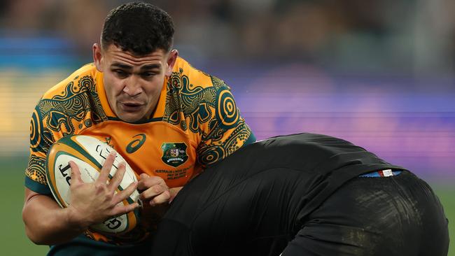 Izaia Perese of the Wallabies takes a tackle. (Photo by Robert Cianflone/Getty Images)