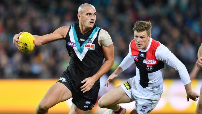 Sam Powell-Pepper of the Power and Jack Newnes of the Saints during Round 16. Picture: AAP