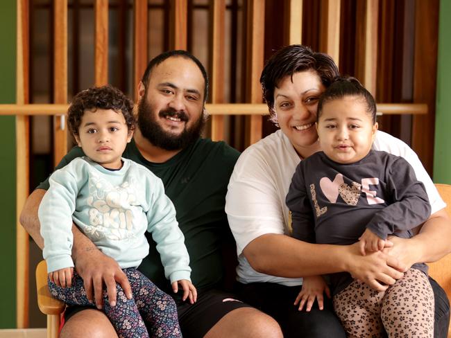 Michael Uluakiola and Anna-Marie Burki, with 3yrs twins, Lavenia Uluakiola (green), Ella Uluakiola (blue) From Mackay, the twins are both sick with Leukaemia. Photo: Steve Pohlner