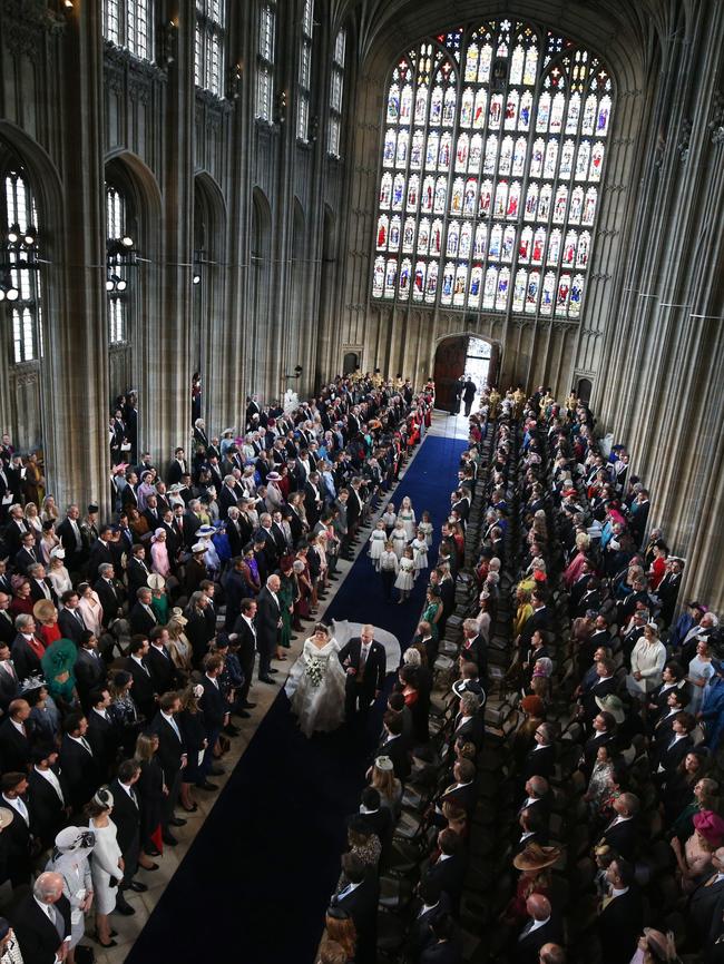 Princess Eugenie walks down the aisle with her father, Prince Andrew, the Duke of York. Picture: Getty