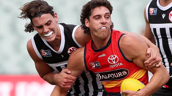 Saturday, 1st April, 2023 - SANFL Showdown. Port Adelaide v Adelaide Crows at the Adelaide Oval. James Borlase of the Adelaide Crows. And Ollie Lord of Port Adelaide Picture: Sarah Reed