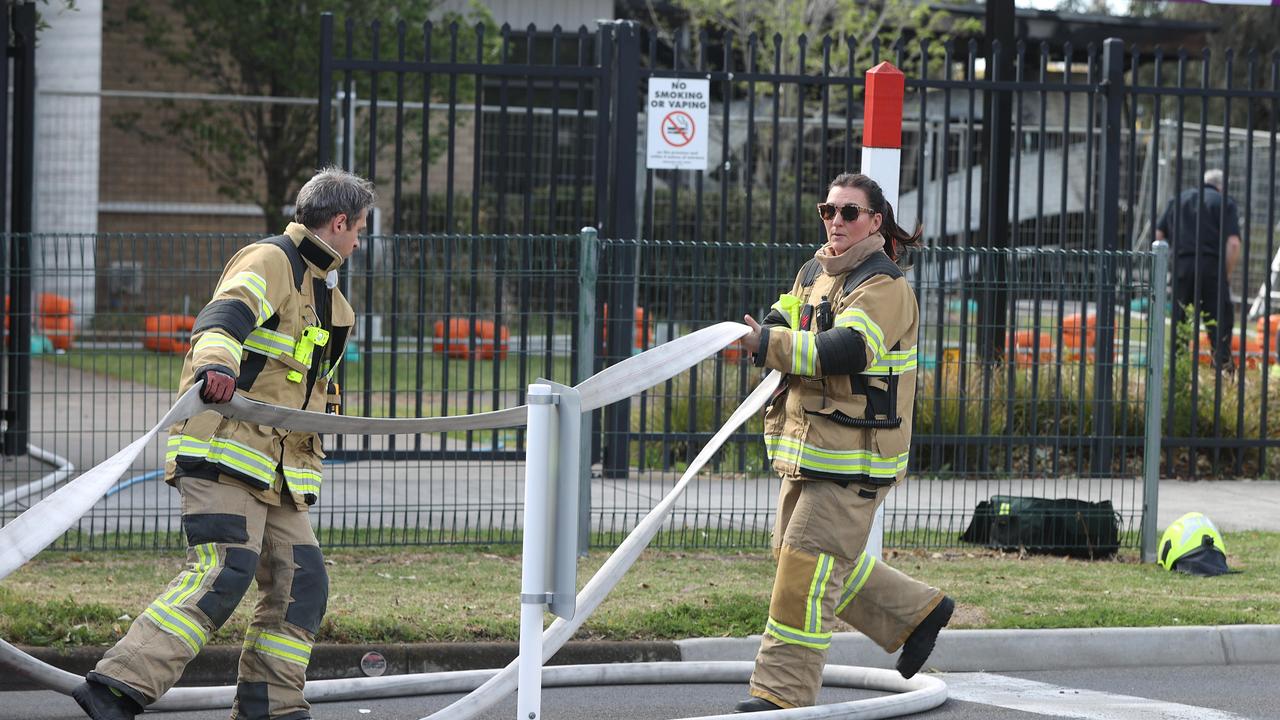 Firefighters returned to Northern Bay College Hendy St campus after reports of smouldering from a fire the previous day. Picture: Alison Wynd