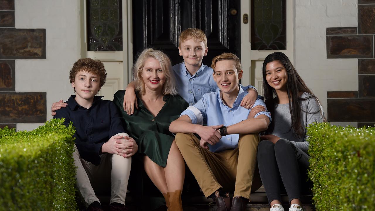 Mum Amy Zadow with children Henry, Samuel, and Thomas, and Thomas&#039 girlfriend, Tania. The family has enjoyed the closeness lockdown has allowed them. Picture: Naomi Jellicoe