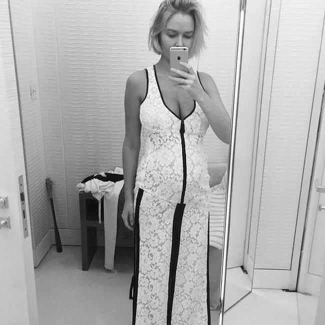 The 35-year-old wore this white lace Louis Vuitton dress to get hitched. Picture: Instagram/LaraWorthington