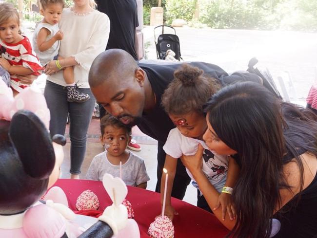 Kim, Kanye and their daughter North at her 2nd birthday party at Disneyland