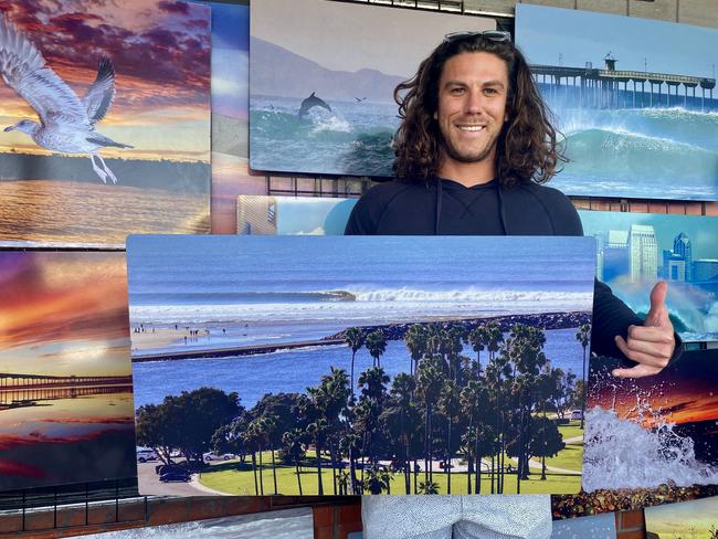 Callum Robinson pictured two weeks ago with a photo by Randy Dible, who recommended the surfing spot in Baja California. Picture: Randy Dible/Instagram