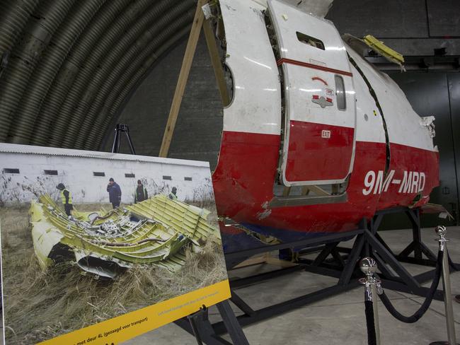 Lost and found ... a piece of the plane next to a photo of where it was found. Picture: Ella Pellegrini