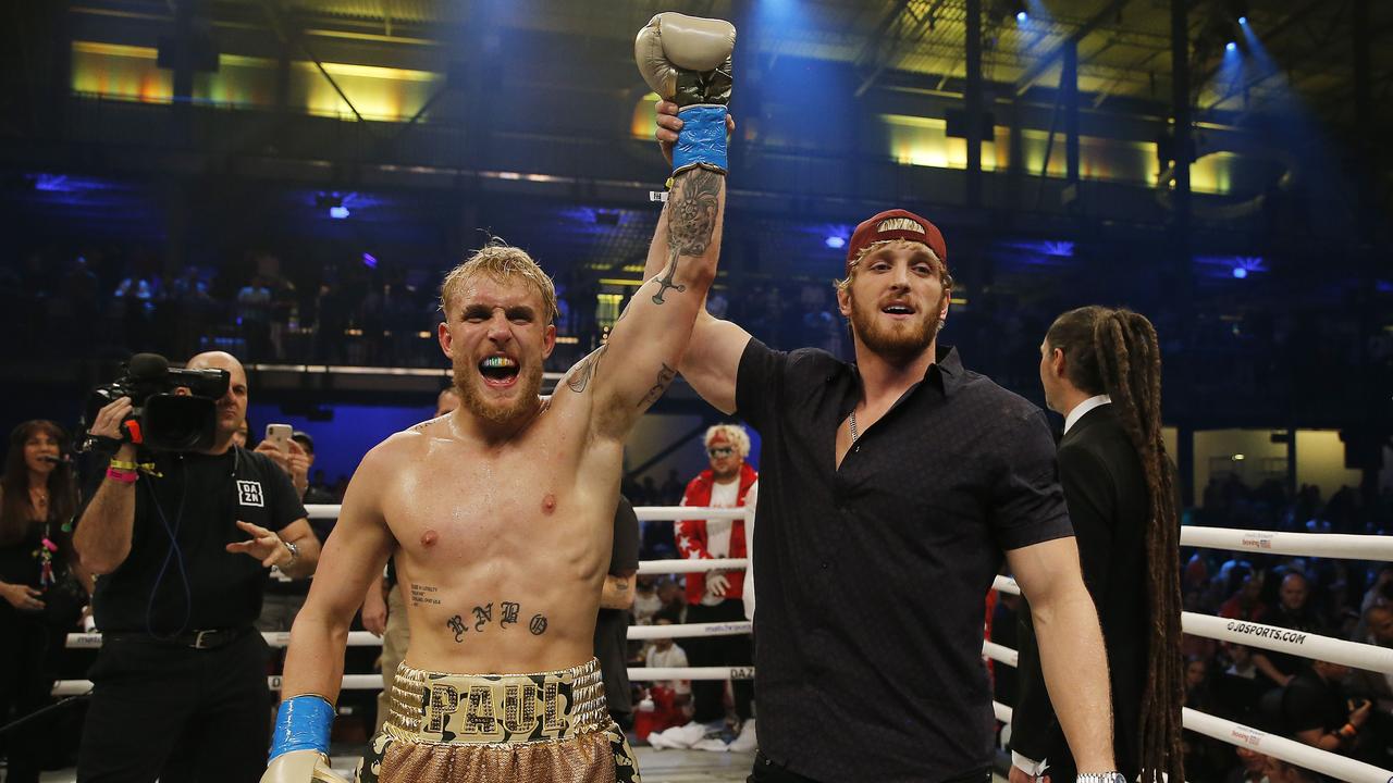 Jake Paul celebrates with his brother, Logan. Photo: Michael Reaves/Getty Images/AFP.