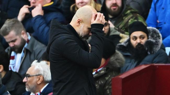 BIRMINGHAM, ENGLAND - DECEMBER 21: Pep Guardiola, Manager of Manchester City, reacts during the Premier League match between Aston Villa FC and Manchester City FC at Villa Park on December 21, 2024 in Birmingham, England. (Photo by Dan Mullan/Getty Images)