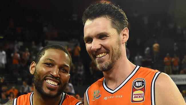 CAIRNS, AUSTRALIA — JANUARY 03: DJ Newbill and Alex Loughton of the Taipans celebrate after winning the round 12 NBL match between the Cairns Taipans and the Brisbane Bullets at Cairns Convention Centre on January 03, 2019 in Cairns, Australia. (Photo by Ian Hitchcock/Getty Images)