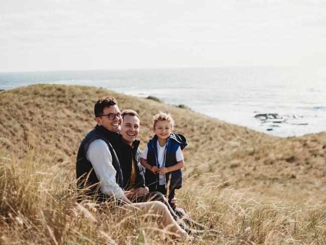 Kittawa Lodge’s Aaron Suine and Nick Stead with their 4-year-old son Abraham love the laid-back King Island lifestyle.