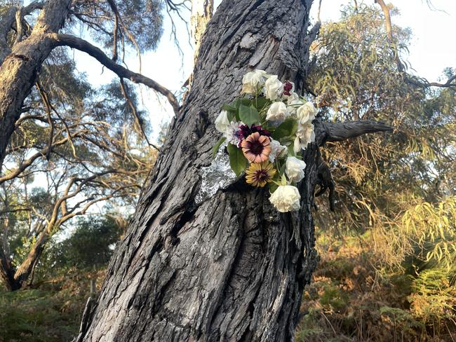 Flowers were left at the scene on Campbell St in Wonthaggi to remember Ms Mills and the dog. Picture: Jack Colantuono