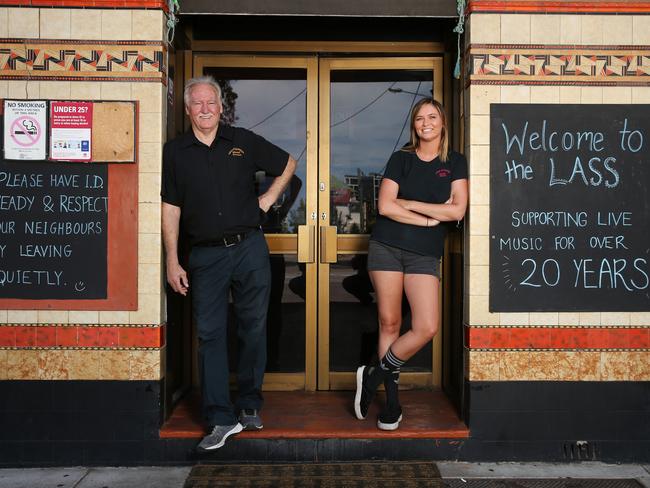 Ian Lobb with his daughter Michelle outside the Lass O’Gowrie Hotel, which is next door to a 135 apartment development. Picture: Peter Lorimer