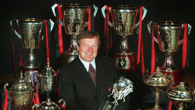 Some of the many day and night premiership cups Kevin Sheedy won as Essendon coach.