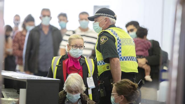 Three flights from Melbourne, Brisbane and Sydney are processed after arriving at Hobart. Picture Chris Kidd