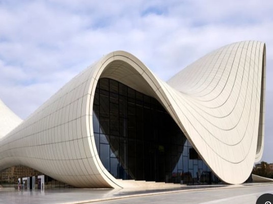 Clad in reinforced concrete and polyester, the 619,000-square-foot Heydar Aliyev Centre in Baku, Azerbaijan, is known for its swooping façade. Architect Zaha Hadid