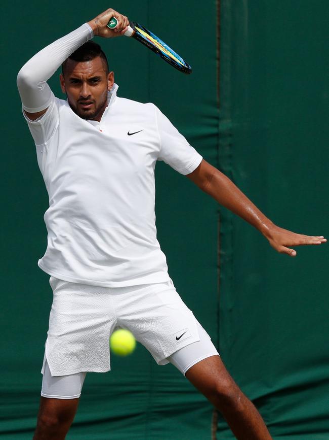 Nick Kyrgios smashes a forehand. Picture: AFP