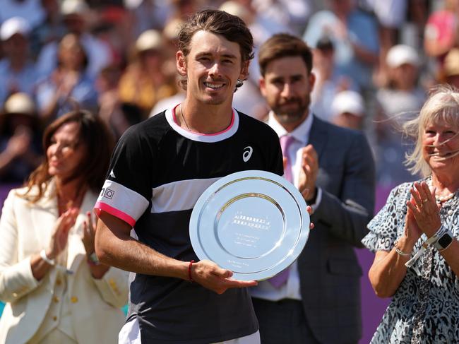 LONDON, ENGLAND - JUNE 25: Alex De Minaur of Australia poses with his runners-up trophy after defeat to Carlos Alcaraz of Spain in the Men's Singles Final match on Day Seven of the cinch Championships at The Queen's Club on June 25, 2023 in London, England. (Photo by Julian Finney/Getty Images)