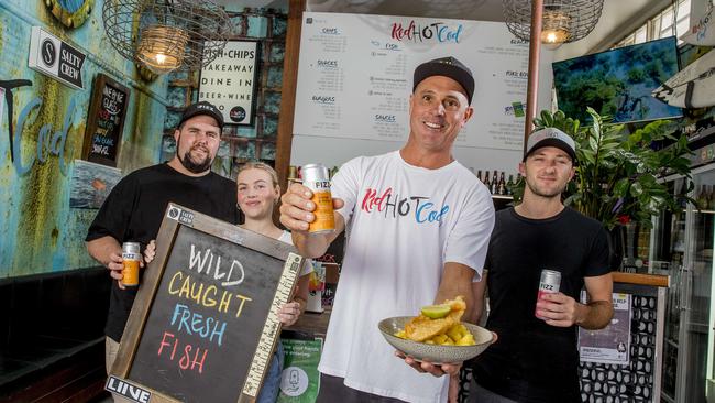 Red Hot Cod at Burleigh has been voted the best fish and chips on the Gold Coast. Kieran Northey, Monet Gleeson, owner Simon Scott and Paddy Malone . Picture: Jerad Williams