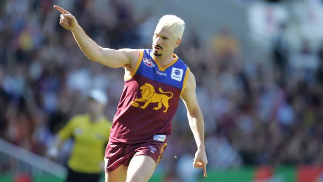 Jason Akermanis celebrates a goal for Brisbane. He will play with South Mornington on June 3.