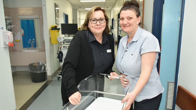 Logan Hospital's nurse unit manager Margaret Wendt and midwife Christopher Geeman.