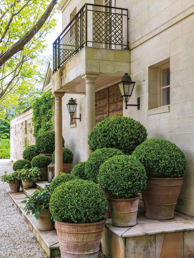 Stepped buxus topiary make for an eye-catching entrance to the Avenue Garden on the Mornington Peninsula, Victoria. Pictures: Simon Griffiths