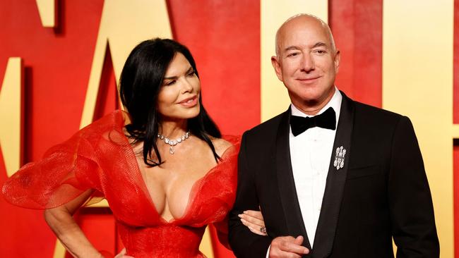 Amazon founder and executive chairman Jeff Bezos with his partner Lauren Sanchez. Picture: AFP