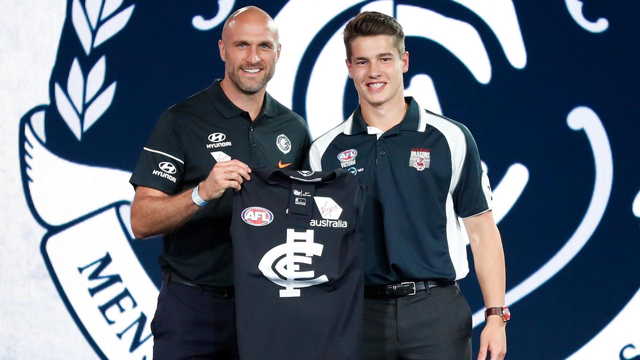 Carlton used a live trade to get Pick 19 and snare Liam Stocker, who was presented his jumper by club great Chris Judd.