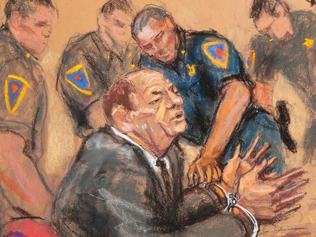 Courtroom sketch of Weinstein being handcuffed after his guilty verdict. Picture: REUTERS/Jane Rosenberg