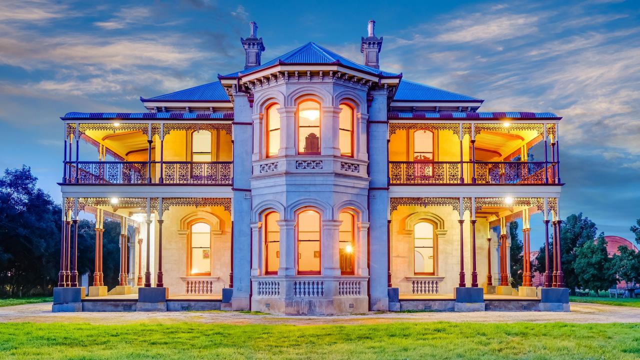 The home’s grandeur was trumpeted with features such as its four double-potted<br/>chimneys, ornate lacework, 21 rooms and imposing ballroom (added around 1896).