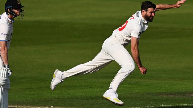 HOVE, ENGLAND - MAY 18:  Michael Neser of Glamorgan bowls as fellow Australian Steve Smith of Sussex looks on during the LV= Insurance County Championship Division 2 match between Sussex and Glamorgan at The 1st Central County Ground on May 18, 2023 in Hove, England. (Photo by Mike Hewitt/Getty Images)