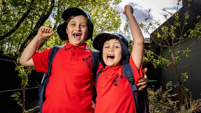 Max (7) and Leo (6) are excited about going back to school when lockdown restrictions ease in Melbourne. Picture: Jake Nowakowski