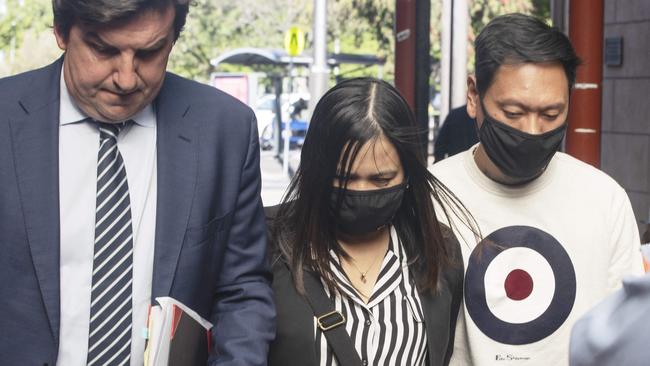 Caroline Nilsson leaves the Supreme Court after being acquitted of murder, flanked by her lawyer Heath Barklay QC and husband Mark Nilsson. Picture Simon Cross