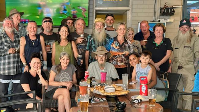 Longtime member of Veterans Australia NT and a former soldier of the 6th Battalion, Royal Australian Regiment (6RAR) Rodney 'Smokey' Bates (seated centre) celebrating his 80th birthday with family and friends at the Noonamah Tavern. Picture: Noonamah Pub / Supplied.