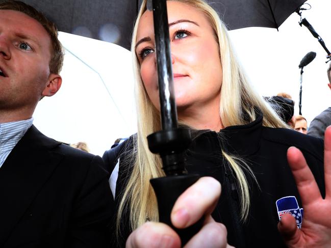 NEWS2019ELECTION 2/05/2019. DAY22/Job2Liberal Candidate Jessica Whelan is rushed to a waiting car to avoid questions from the travelling media pack about her anti muslim comments on her facebook page.Prime Minister Scott Morrison started day 22 campaigning in Tasmania with his wife Jenny at an Agriculture festival with Jessica Whelan. Picture Gary Ramage