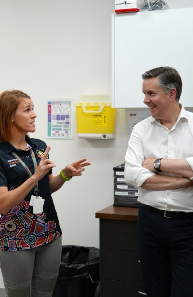 Federal health and aged care minister Mark Butler talks to a worker at the Alice Springs Urgent Care Clinic on Monday, December 16.