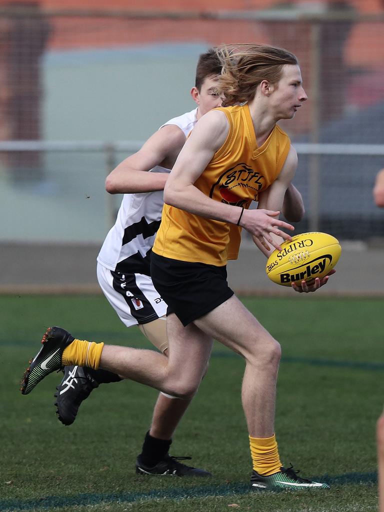 Under 16 Boys STJFL vs. NTJFA match, North Hobart Oval: South's Edward Wright runs the ball out of defence. Picture: LUKE BOWDEN