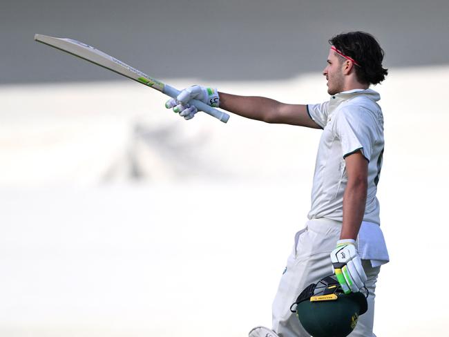 Sam Konstas celebrates reaching his century in Canberra. Picture: AFP.