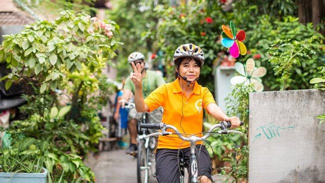 Cycle through the vibrant streets of Bangkok.