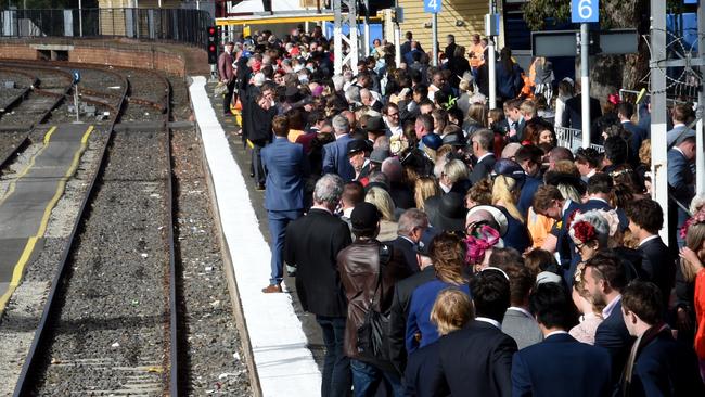 Crowds at the train station after the Melbourne Cup at Flemington. Picture: Nicole Garmston