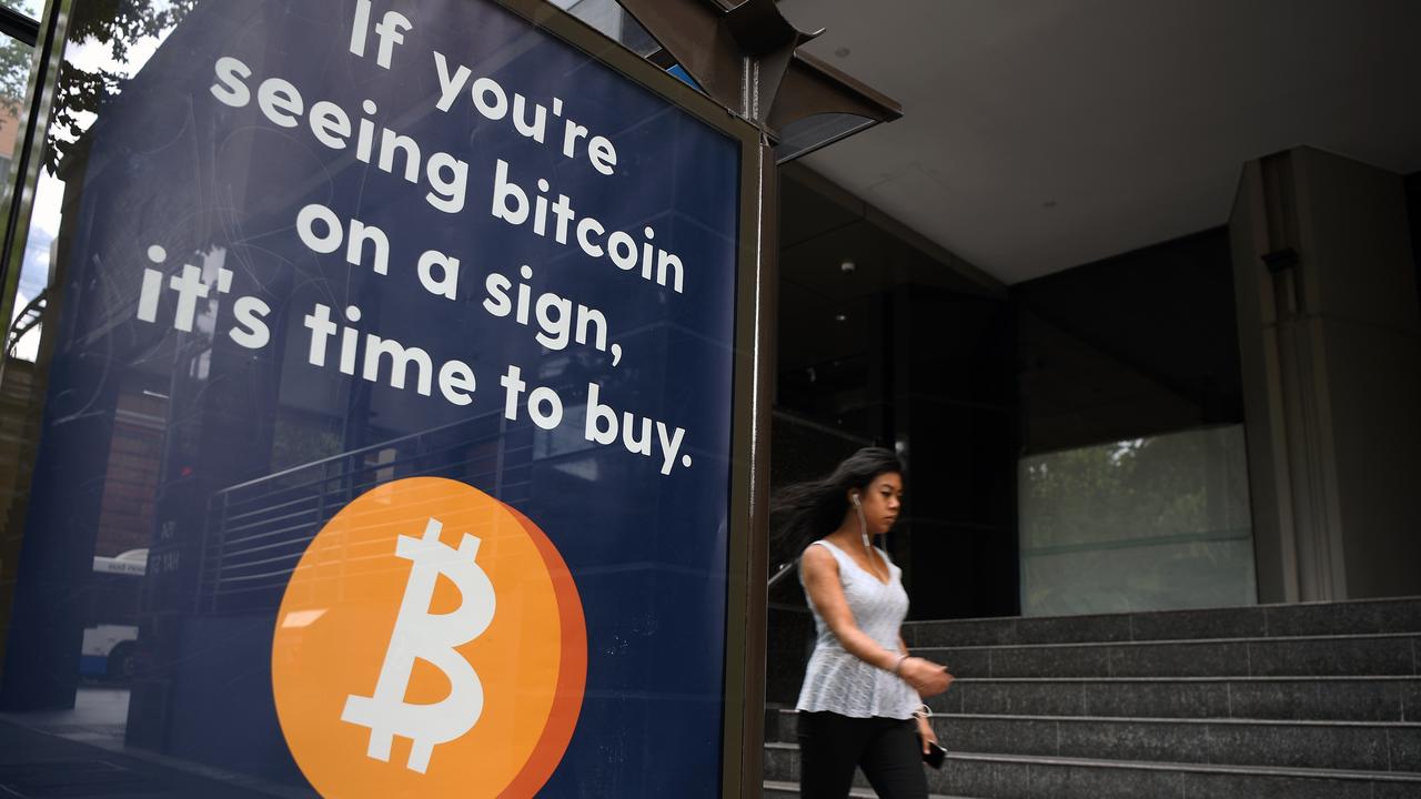 A cryptocurrency advertisement on a bus shelter in Sydney. Picture: Joel Carrett/NCA NewsWire