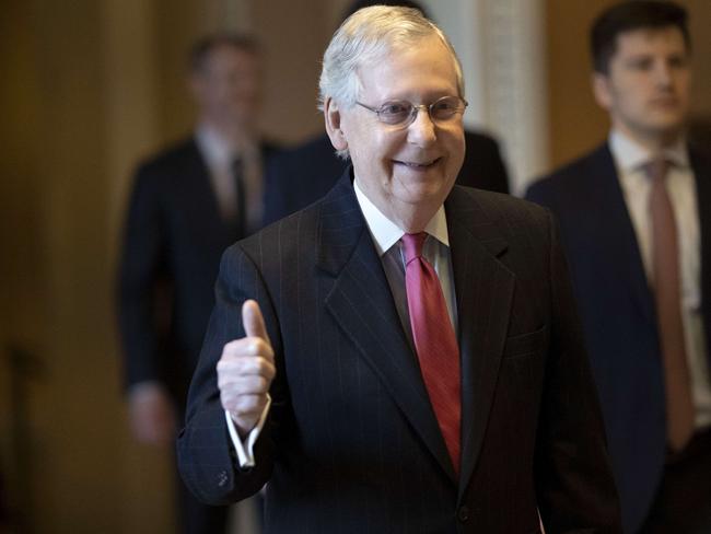 US Senate Majority Leader Mitch McConnell gives a thumbs-up sign after the Senate reportedly reached an agreement on a trillion-dollar stimulus. Picture: Getty Images/AFP