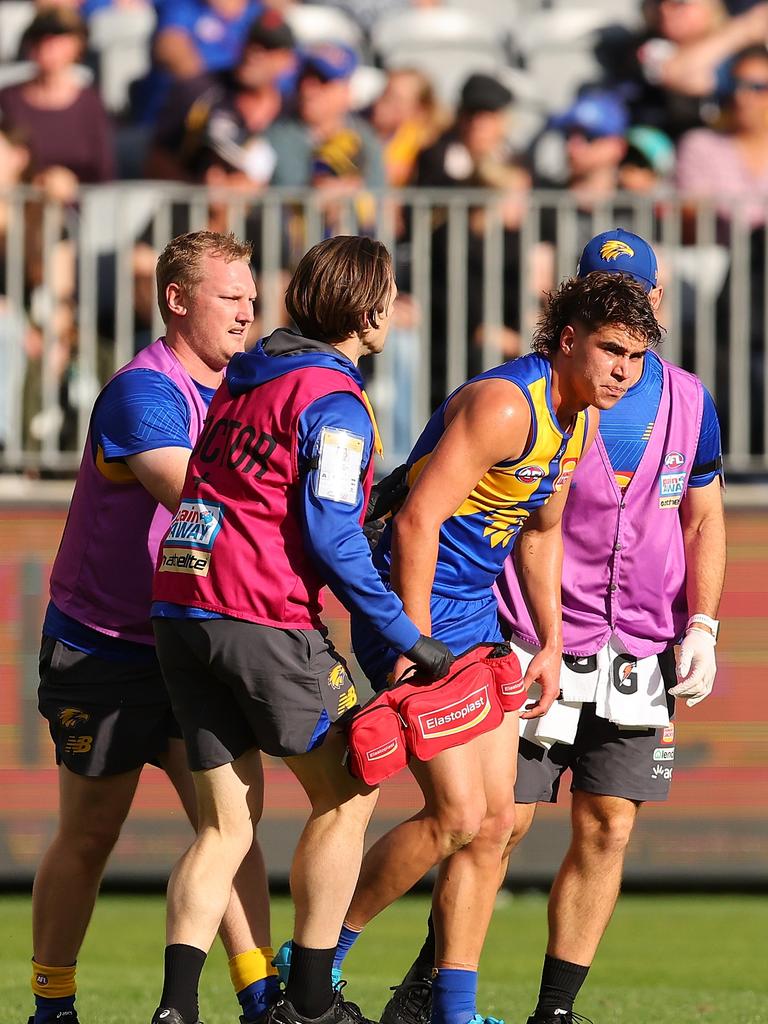 Hewett had to be helped from the field. (Photo by Paul Kane/Getty Images)