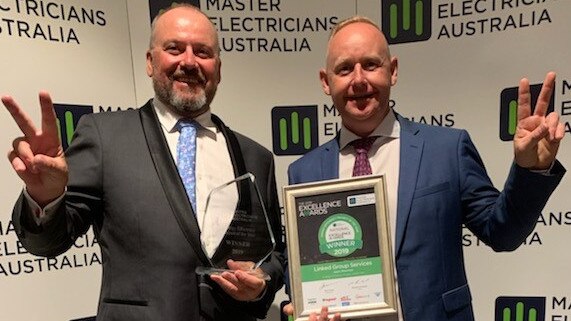 Linked Group Services chief executive Peter Shaw and managing director Jason Sharam received the Energy Efficiency Project of the Year Award.