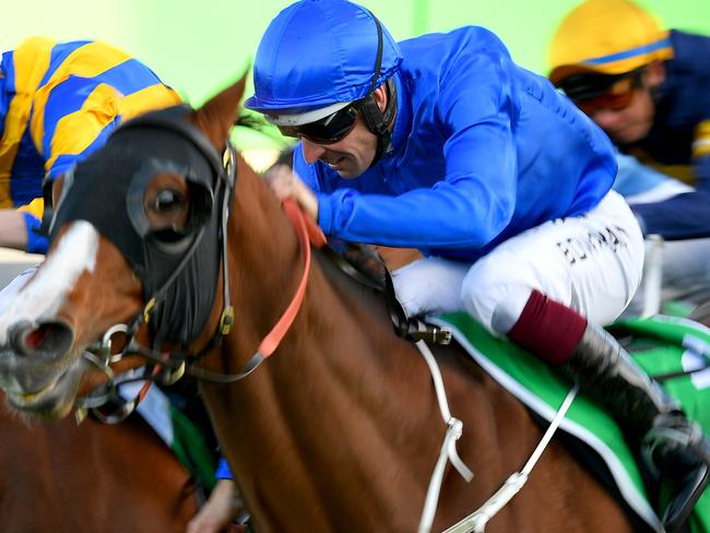 Jockey Hugh Bowman rides Phaistos (right) to victory in Race 8, the TAB Handicap, during Royal Randwick Raceday at Royal Randwick Racecourse in Sydney, Saturday, May 2, 2020. (AAP Image/Dan Himbrechts) NO ARCHIVING, EDITORIAL USE ONLY