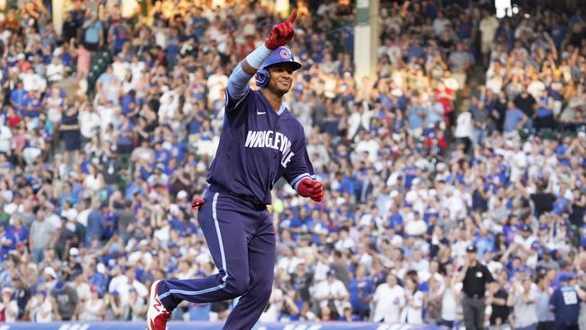 A game between the Chicago Cubs and St Louis Cardinals went ahead with 39,095 people despite a daily case average of 319 in Illinois.